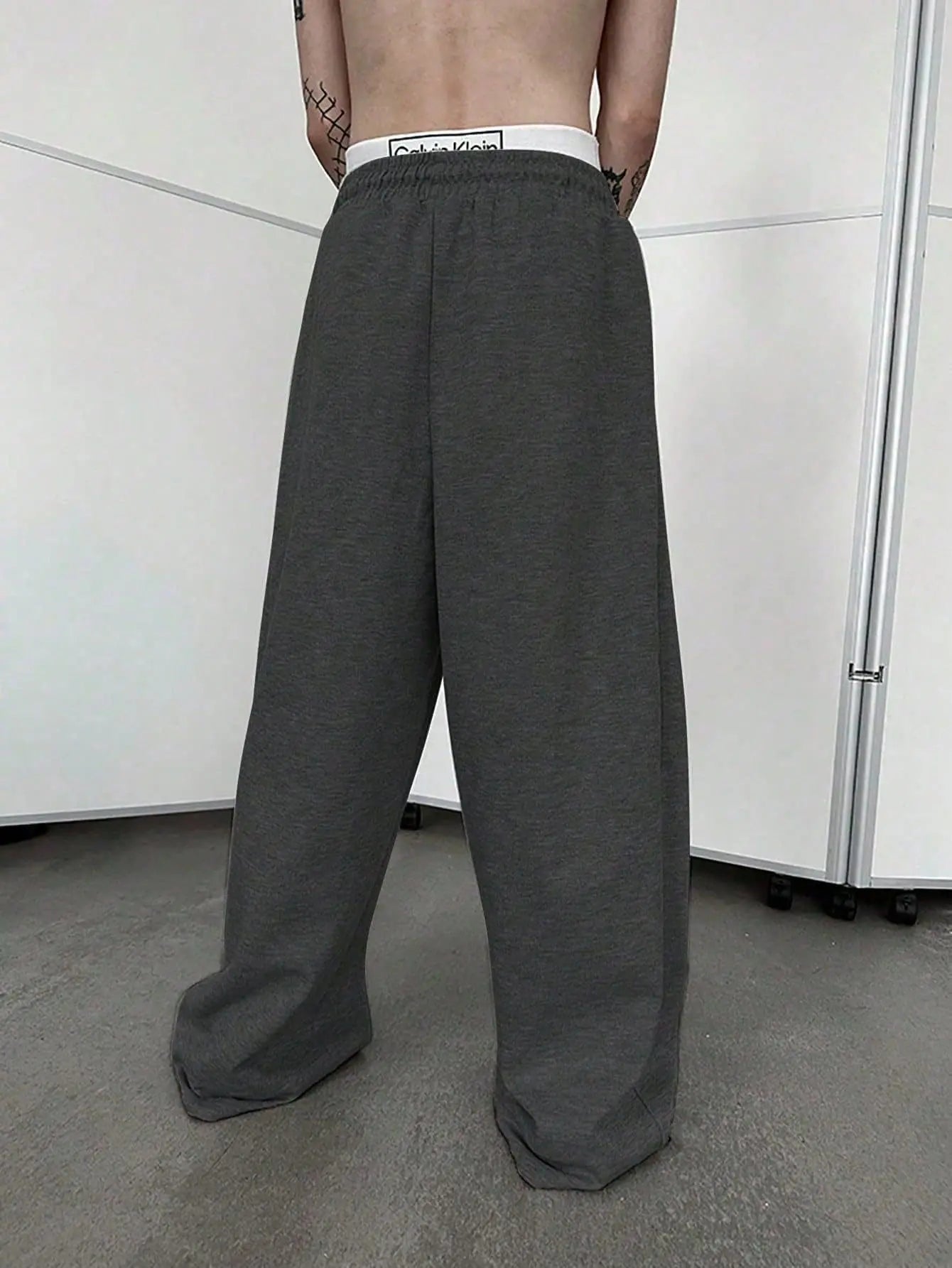 European and American men's waist trousers waist drawstring straight wide-leg loose trousers sports trousers pocket men pants